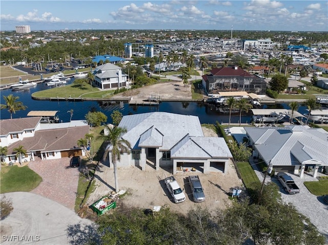 bird's eye view with a water view