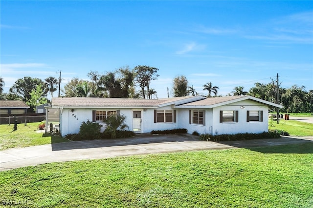 single story home with a front yard