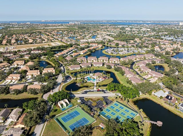 drone / aerial view with a water view