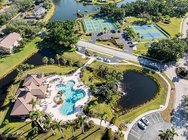 bird's eye view with a water view