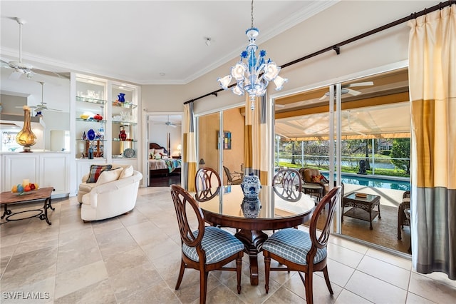 dining area with ceiling fan and crown molding