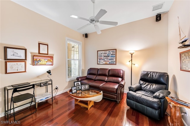 living room with dark hardwood / wood-style floors and ceiling fan