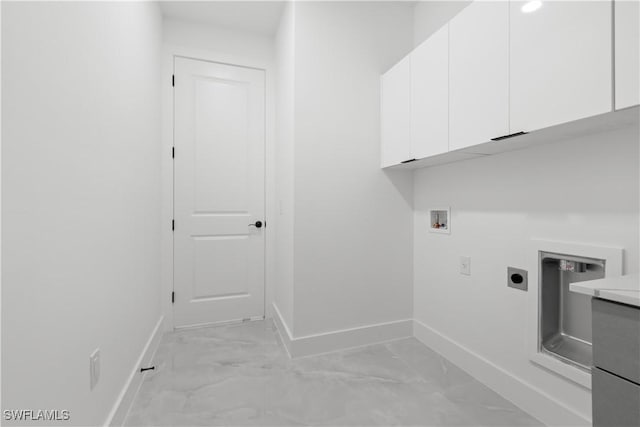 laundry area with hookup for an electric dryer, cabinets, and hookup for a washing machine