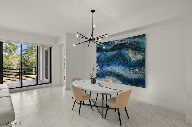 1125 Central Ave Unit 269, Naples, FL 34102 - dining area featuring marble finish floors, a chandelier, and baseboards