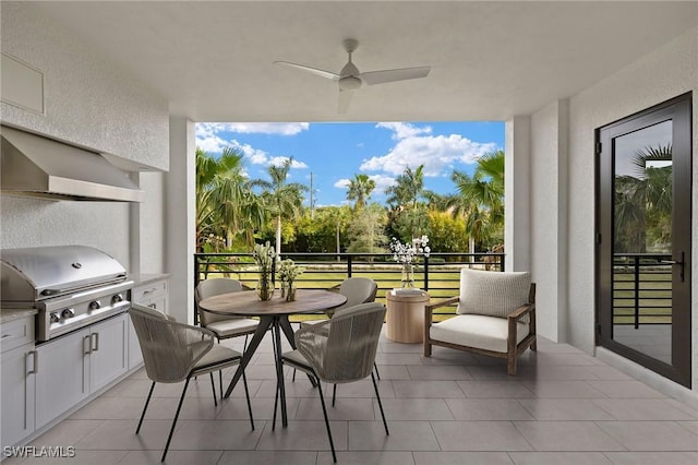 view of patio featuring ceiling fan, a grill, area for grilling, and a balcony