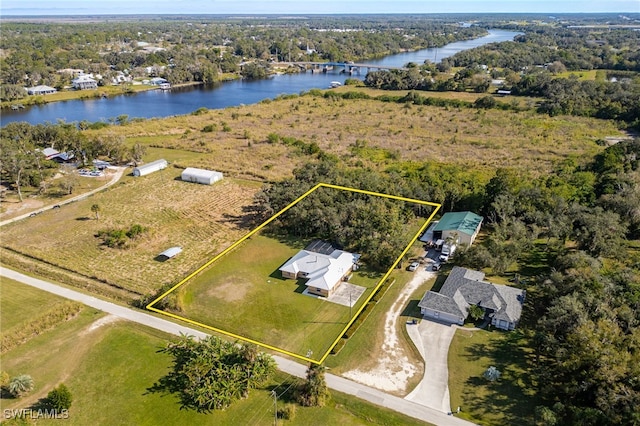 bird's eye view with a water view