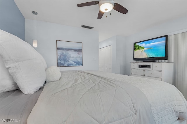 bedroom featuring a closet and ceiling fan