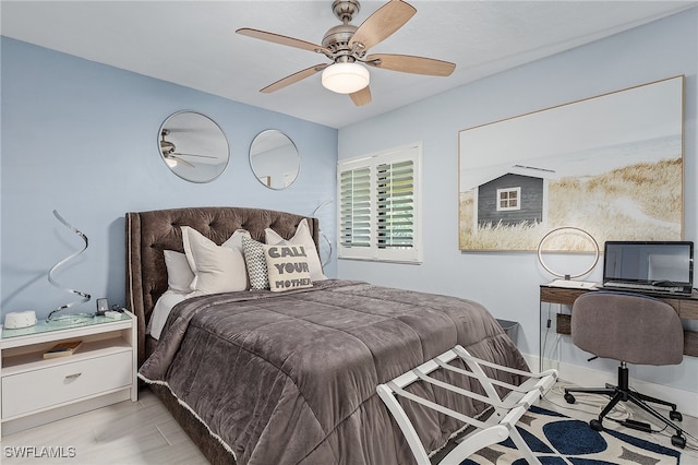 bedroom featuring ceiling fan and light wood-type flooring