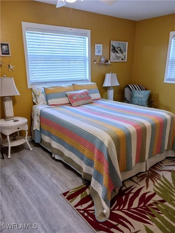 bedroom featuring wood-type flooring