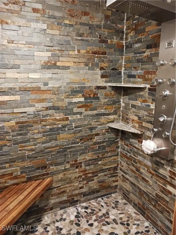 bathroom featuring walk in shower