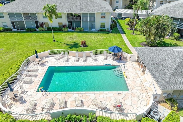 view of swimming pool featuring a patio area