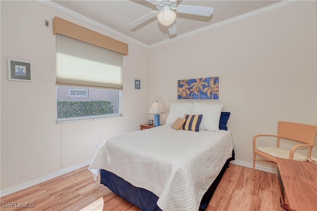 bedroom with wood-type flooring, ceiling fan, and ornamental molding