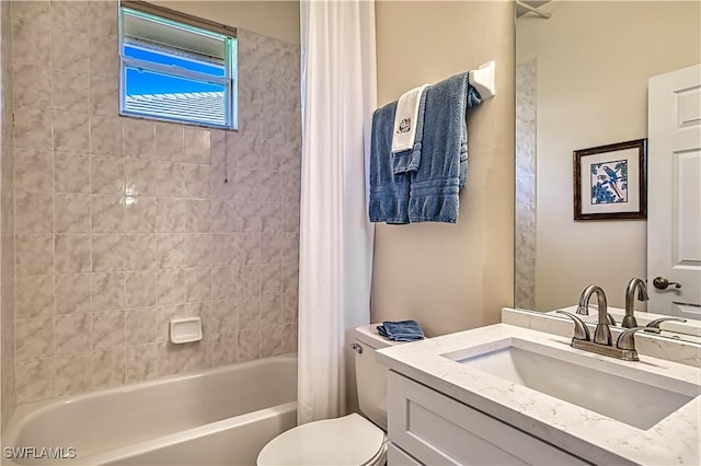 full bathroom featuring vanity, toilet, and shower / tub combo