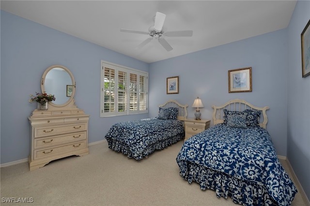 bedroom with carpet flooring and ceiling fan