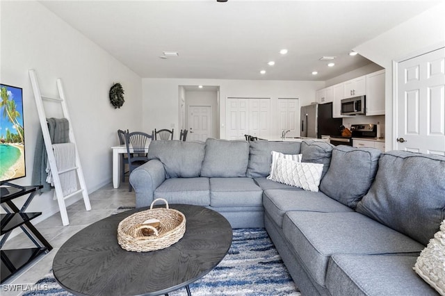 living room featuring sink