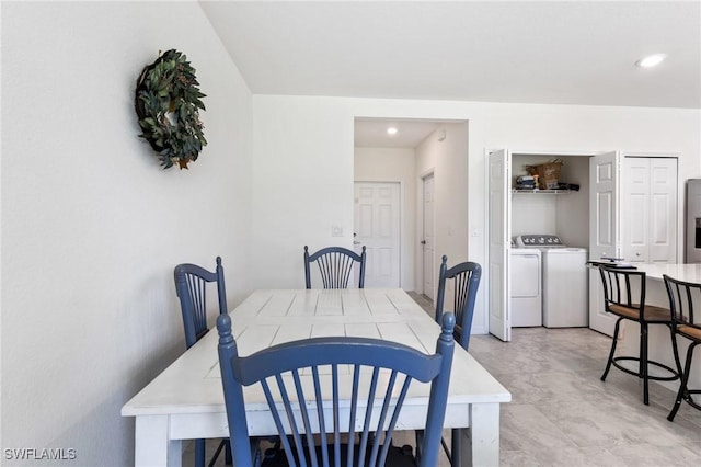 dining area featuring separate washer and dryer