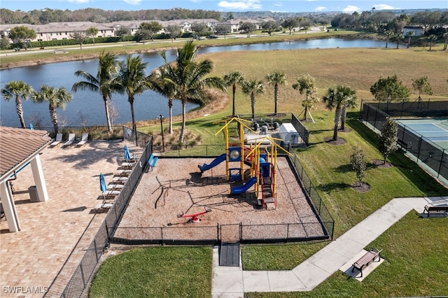 view of playground with a water view