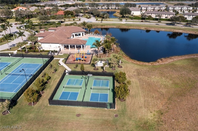 birds eye view of property featuring a water view