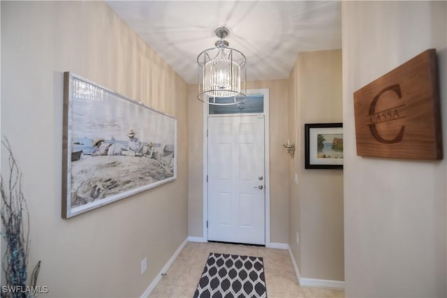 doorway featuring an inviting chandelier