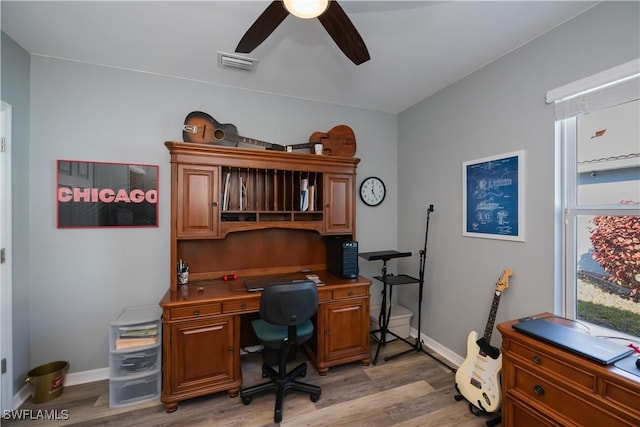 office space featuring ceiling fan and light hardwood / wood-style flooring