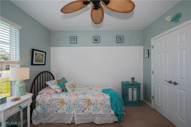 bedroom with carpet flooring and ceiling fan