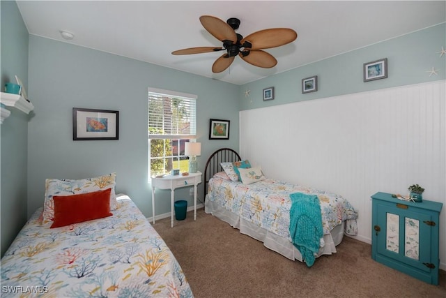 bedroom with ceiling fan and carpet