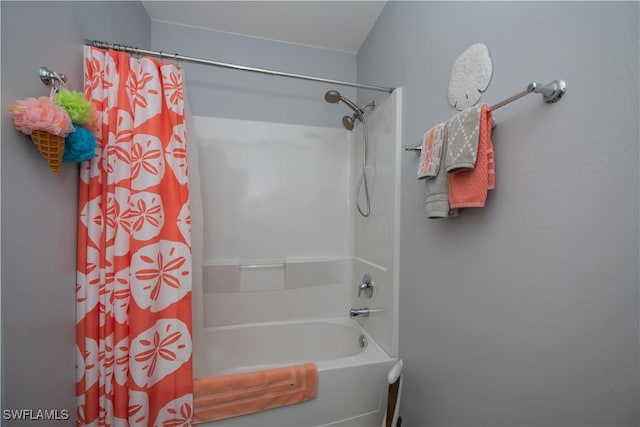 bathroom featuring shower / bathtub combination with curtain