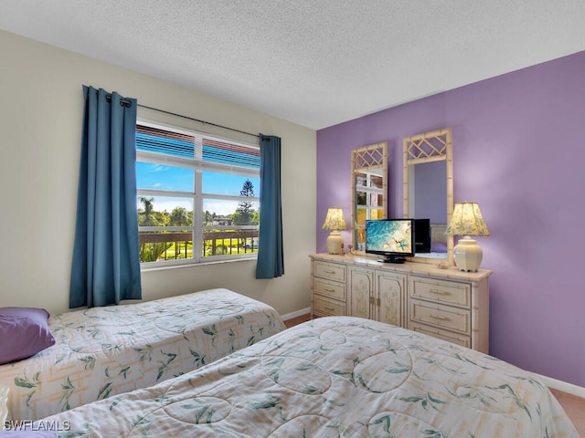 bedroom with a textured ceiling