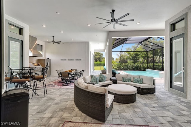 view of patio featuring a lanai and an outdoor hangout area