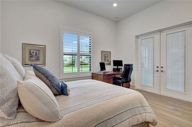 19749 Panther Island Blvd, Estero, FL 33928 - bedroom featuring french doors, light wood-type flooring, a desk, and recessed lighting