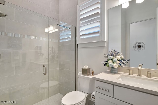 19749 Panther Island Blvd, Estero, FL 33928 - full bathroom featuring a stall shower, vanity, and toilet