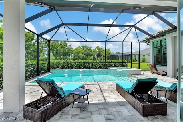 view of swimming pool with a lanai, an in ground hot tub, pool water feature, and a patio