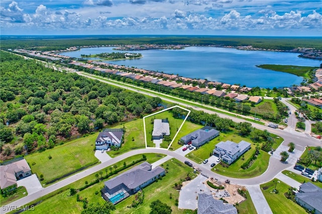 bird's eye view with a water view