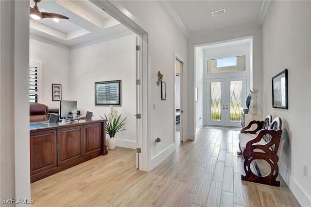 entrance foyer with french doors and crown molding