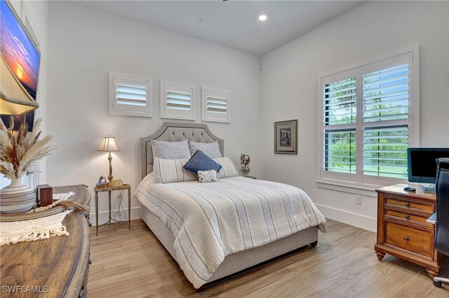 19749 Panther Island Blvd, Estero, FL 33928 - bedroom with baseboards, light wood-style floors, and recessed lighting