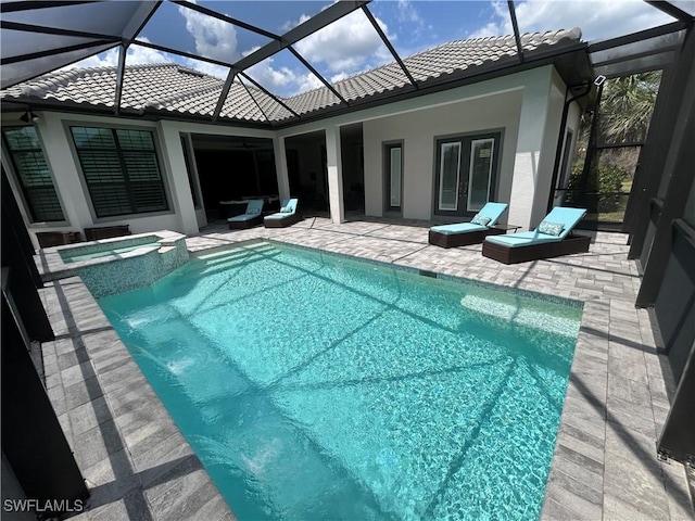 19749 Panther Island Blvd, Estero, FL 33928 - view of swimming pool with a patio area, a lanai, and a pool with connected hot tub