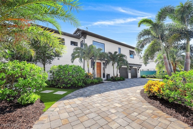 view of front of property with a garage