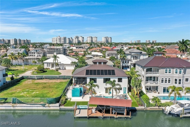 drone / aerial view with a water view