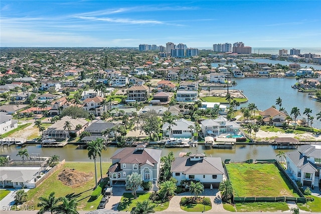 drone / aerial view with a water view