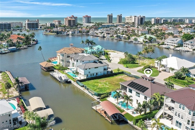 drone / aerial view with a water view