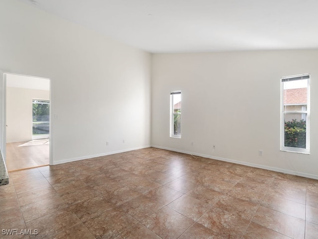 empty room featuring plenty of natural light