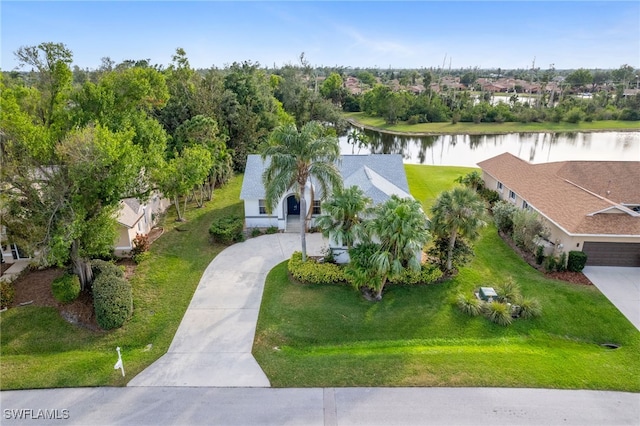 birds eye view of property featuring a water view