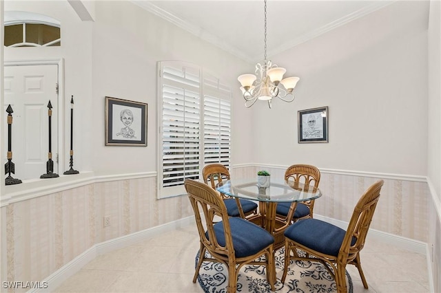 tiled dining space with a chandelier and ornamental molding