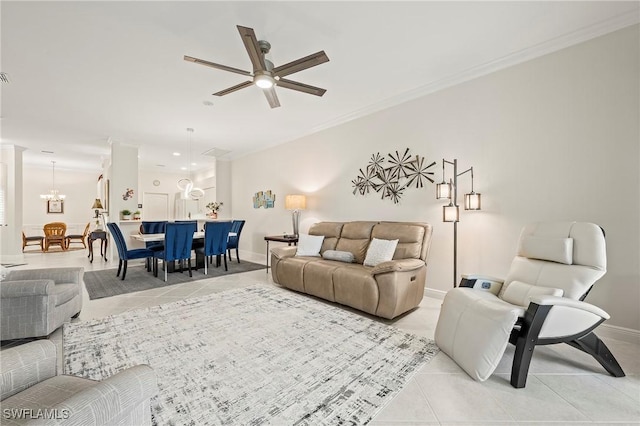 tiled living room with ceiling fan and ornamental molding