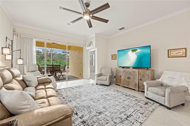 living room featuring ceiling fan, light tile patterned floors, and ornamental molding