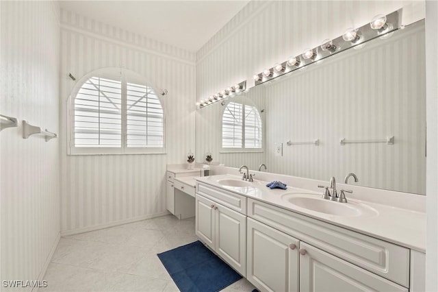 bathroom with tile patterned flooring and vanity