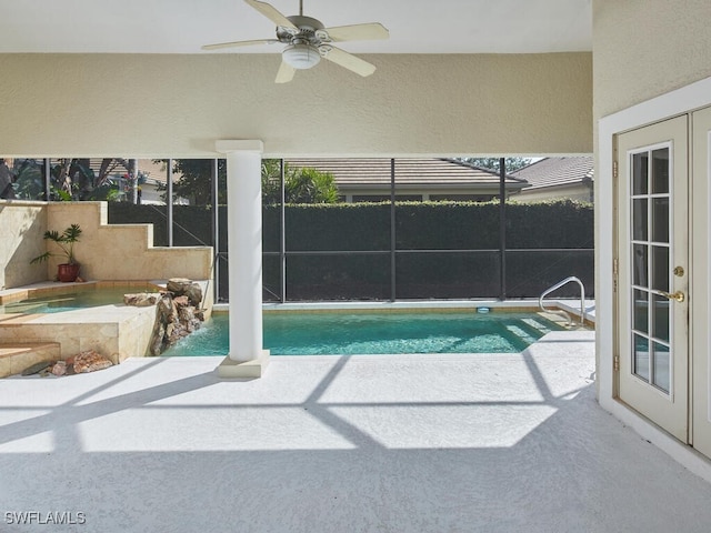 view of pool with an in ground hot tub, a patio area, a ceiling fan, and a fenced in pool