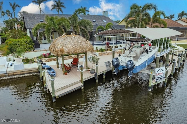 dock area featuring a water view