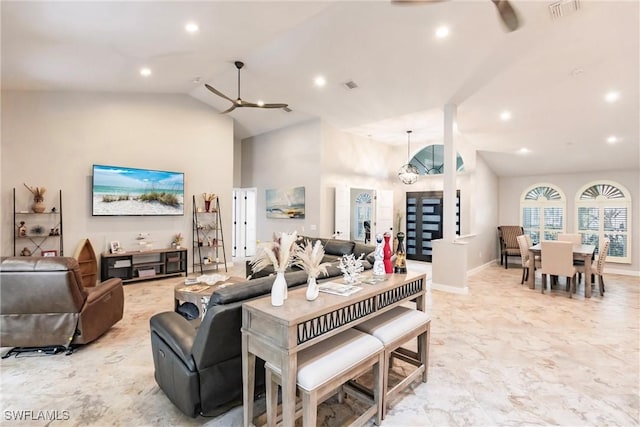 living room with vaulted ceiling and ceiling fan