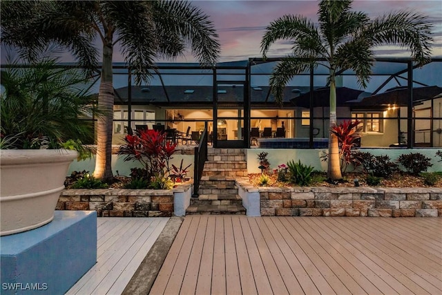 deck at dusk with a lanai